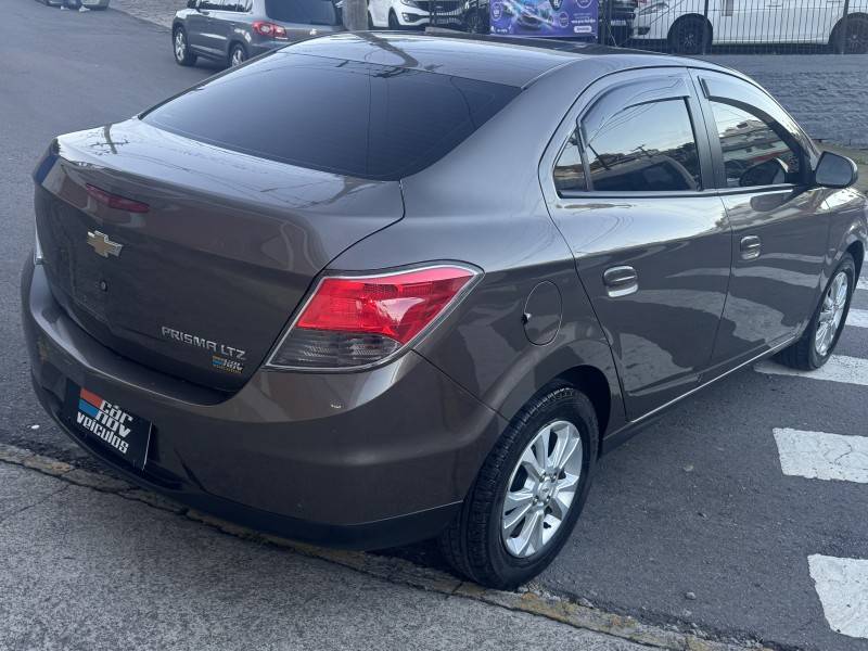 CHEVROLET - PRISMA - 2014/2014 - Marrom - R$ 51.800,00