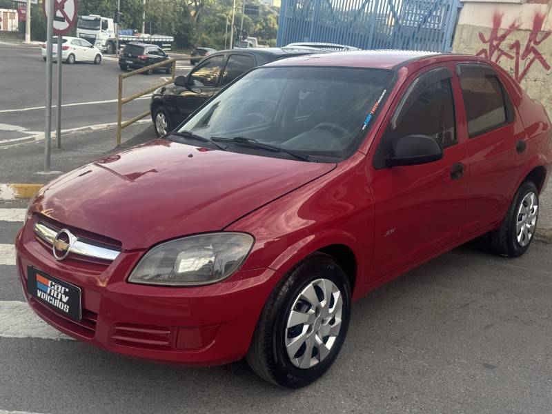 CHEVROLET - PRISMA - 2010/2010 - Vermelha - R$ 25.900,00